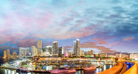 Magnificent dusk colors of Miami skyline, Florida. Panoramic sun