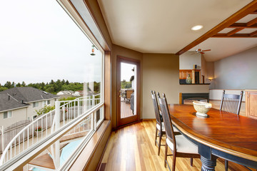 Open floor plan dining area with big window
