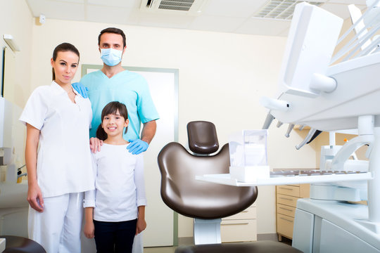 Dentist Team with a little girl.