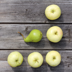  real and useful fruit/ flat lay of apples and pears on old wooden background 