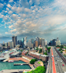 Naklejka premium Magnificence of Sydney Harbour at sunset from Harbour Bridge Tow