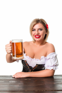 Beautiful young blond girl of oktoberfest beer stein