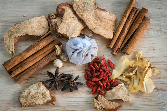 Different ingredients for Chinese soup on wooden background and flat lay, Chinese herbal Ingredient for healthy concept