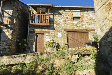 Deteriorated house, wood and stone houses in the province of Zam