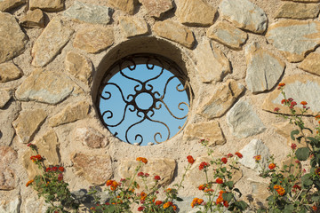 Obraz na płótnie Canvas Rusty Foundry Window at Lighthouse Door - La Manga del Mar Menor, Cabo de Palos, Cartagena and San Javier, Murcia, Spain, Europe