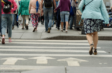 Close legs and feet cross busy crossing