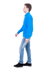 Back view of going  handsome man. walking young guy . Rear view people collection.  backside view of person.  Isolated over white background. Curly boy in the blue jacket is thoughtfully to one side.