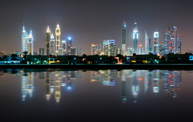 Fototapeta na wymiar Amazing night dubai downtown skyline with tallest skyscrapers and beautiful Jumeirah beach reflection, Dubai, United Arab Emirates