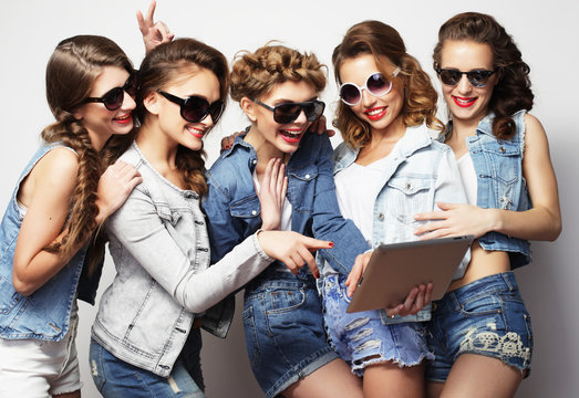 five hipster girls friends taking selfie with digital tablet