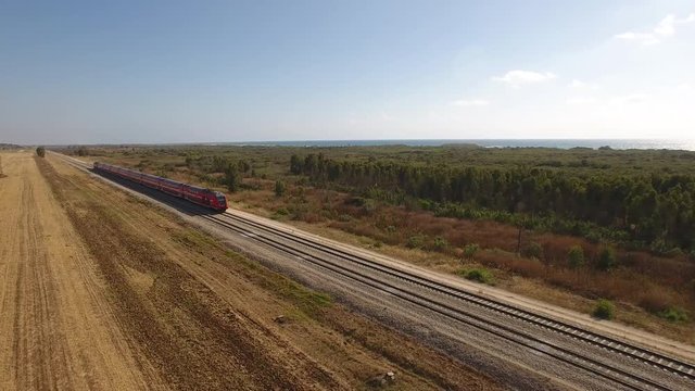 Aerial video of a train on railroad tracks
