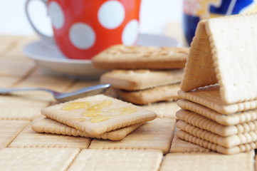 Cracker house and crackers with honey for breakfast. Crackers with coffee.