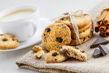 Cookies with chocolate on a table for dessert. Fresh biscuits with coffee for breakfast.