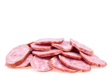 Slices of salami sausages isolated on a white background.