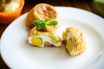 zucchini muffins baked with egg inside