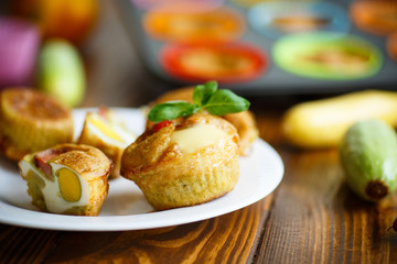 zucchini muffins baked with egg inside