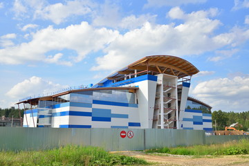 Construction of a sports complex with a swimming pool in the vil