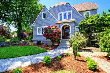 American craftsman house exterior. View of entry door and porch