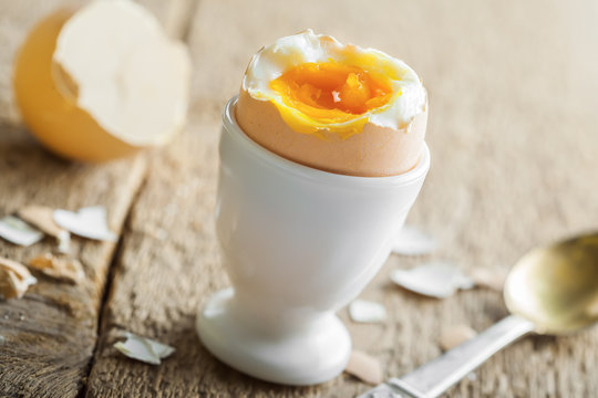 Breakfast with perfect soft boiled egg on a table. Traditional homemade food.