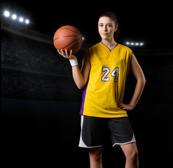 Fototapeta premium Young girl basketball player