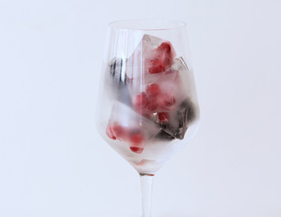 Ice Cubes with frozen Berries