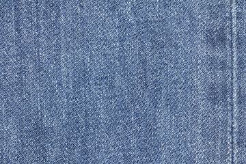 Naklejka premium Denim jeans texture or denim jeans background with seam of fashion jeans design with copy space for text or image.