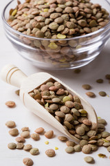 lentils with scoop and glass bowl