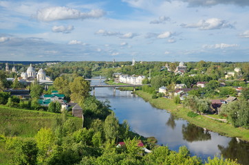 Fototapeta na wymiar The view from the heights of the city of Torzhok in the Tver region and the river Tvertsa, Russia