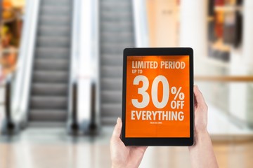 business and modern lifestyle concept: Young woman buys online 30% off