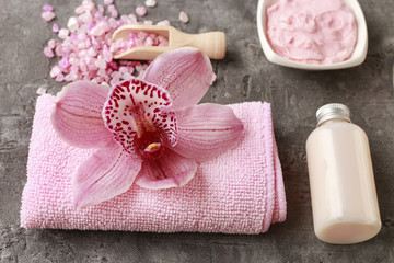 Pink orchid flower on soft towel