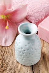 Fototapeta na wymiar Ceramic vase with essential oil