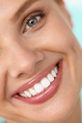 Beautiful Smile. Smiling Woman Face With White Teeth, Full Lips. High Resolution Image