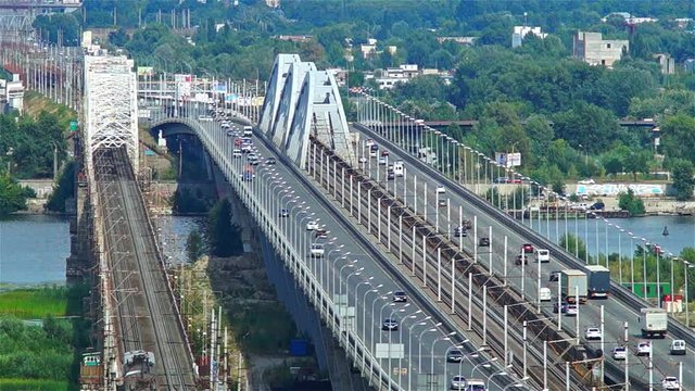 Cars And Train On The Bridge