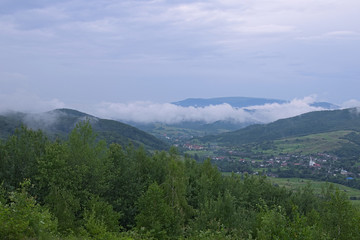 Mountains in haze after rain. Picturesque landscape. Zakarpatska oblast, Ukraine.