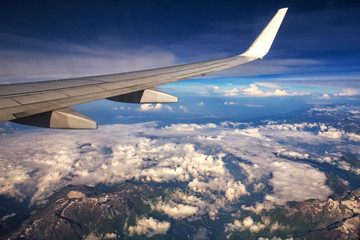 Obraz premium Himalaya mountains under clouds. View from the airplane