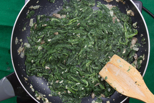 spinach cooking in pan