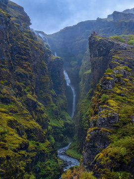 The waterfall Glymur, with a fall of 196 m., is the second highest waterfall of Iceland. It falls into a deep beautiful canyon covered with green moss.