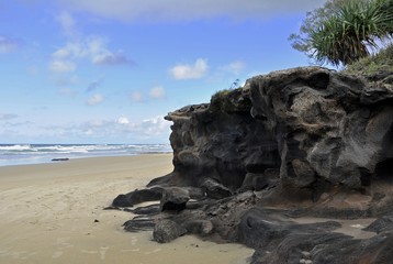 Fototapeta na wymiar Coffee Rocks on the East Beach of Fraser Island, Queensland Australia 
