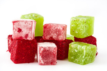 Sweet pieces of turkish delight isolated on white background


