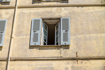 Fototapeta na wymiar Windows of the buildings in Ajaccio in Corsica - 2