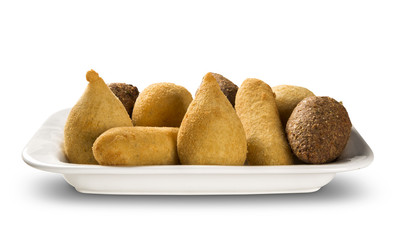 Mixed brazilian snack on white background.