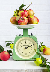 Apples fruit on old vintage scale 1960. One division of 20 grams. Only for domestic use