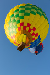 Hot air balloons against blue sky