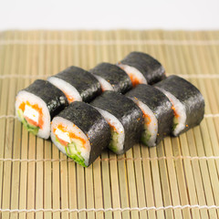 Isolated sushi / rolls.