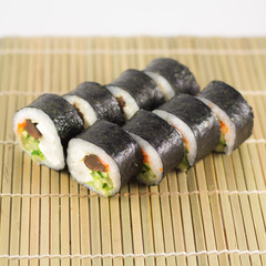 Isolated sushi / rolls.