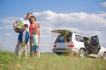 Happy family enjoying road trip and summer vacation