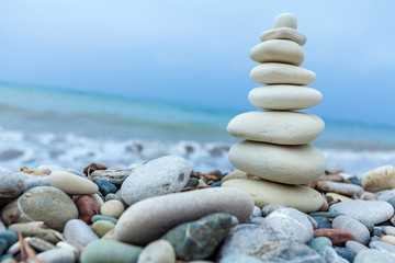 Pyramid of Stones near Sea on Beach