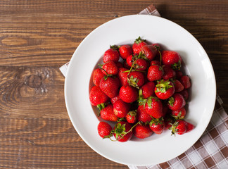 Strawberries on the white plate