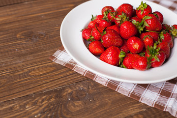 Strawberries on the white plate