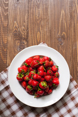 Strawberries on the white plate
