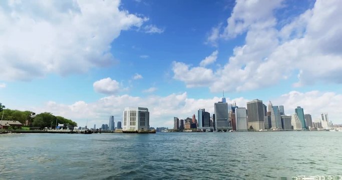A view of the lower Manhattan skyline and Freedom Tower as seen from the harbor on the East River Ferry.  	